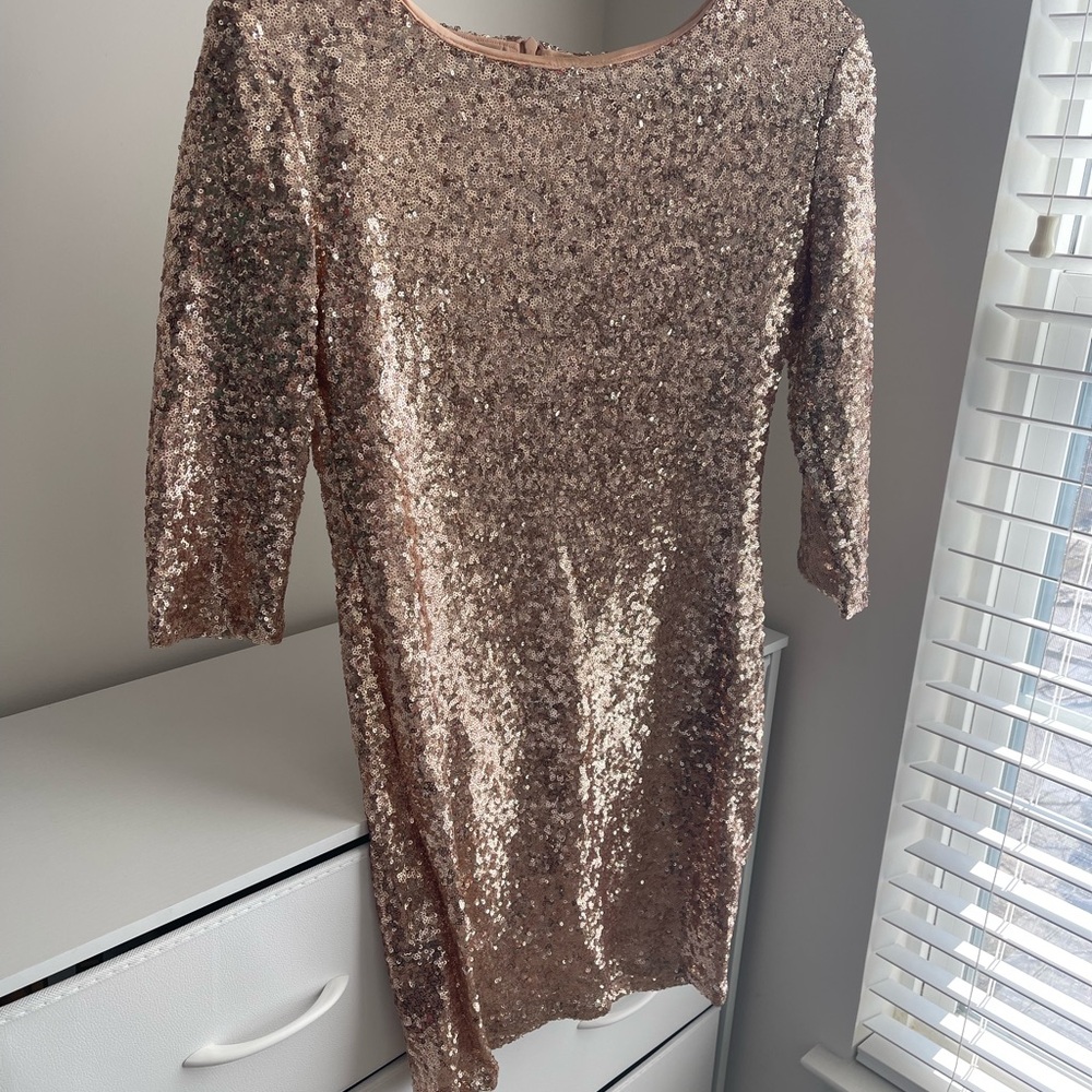 Gorgeous rose gold Shimmering Copper Sequin Dress. Size large.